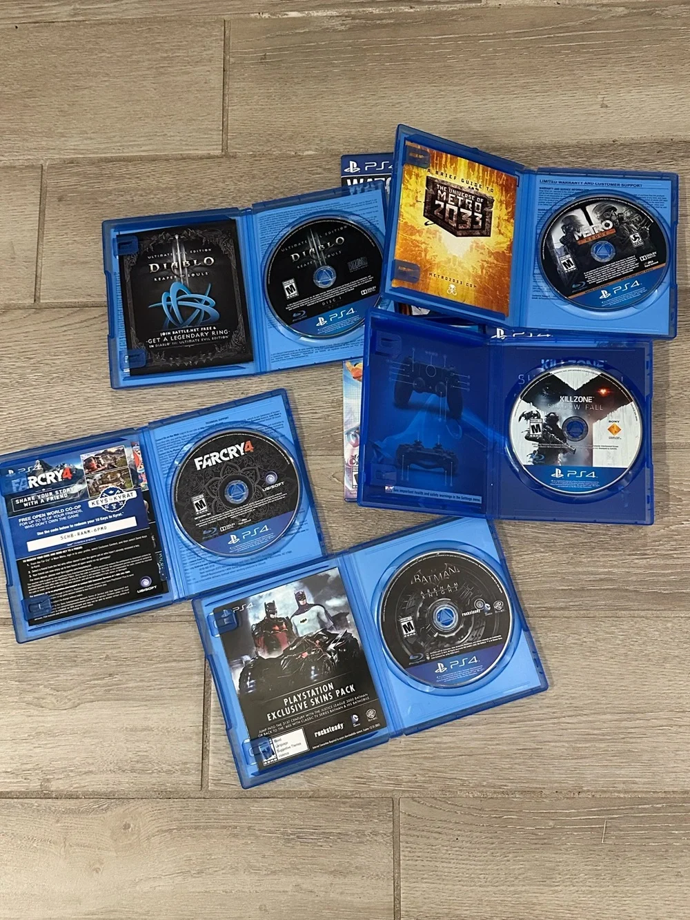 PlayStation 4 Video Games Lot (8) (Watch Dogs, Metro Redux, Batman, Far Cry 4)